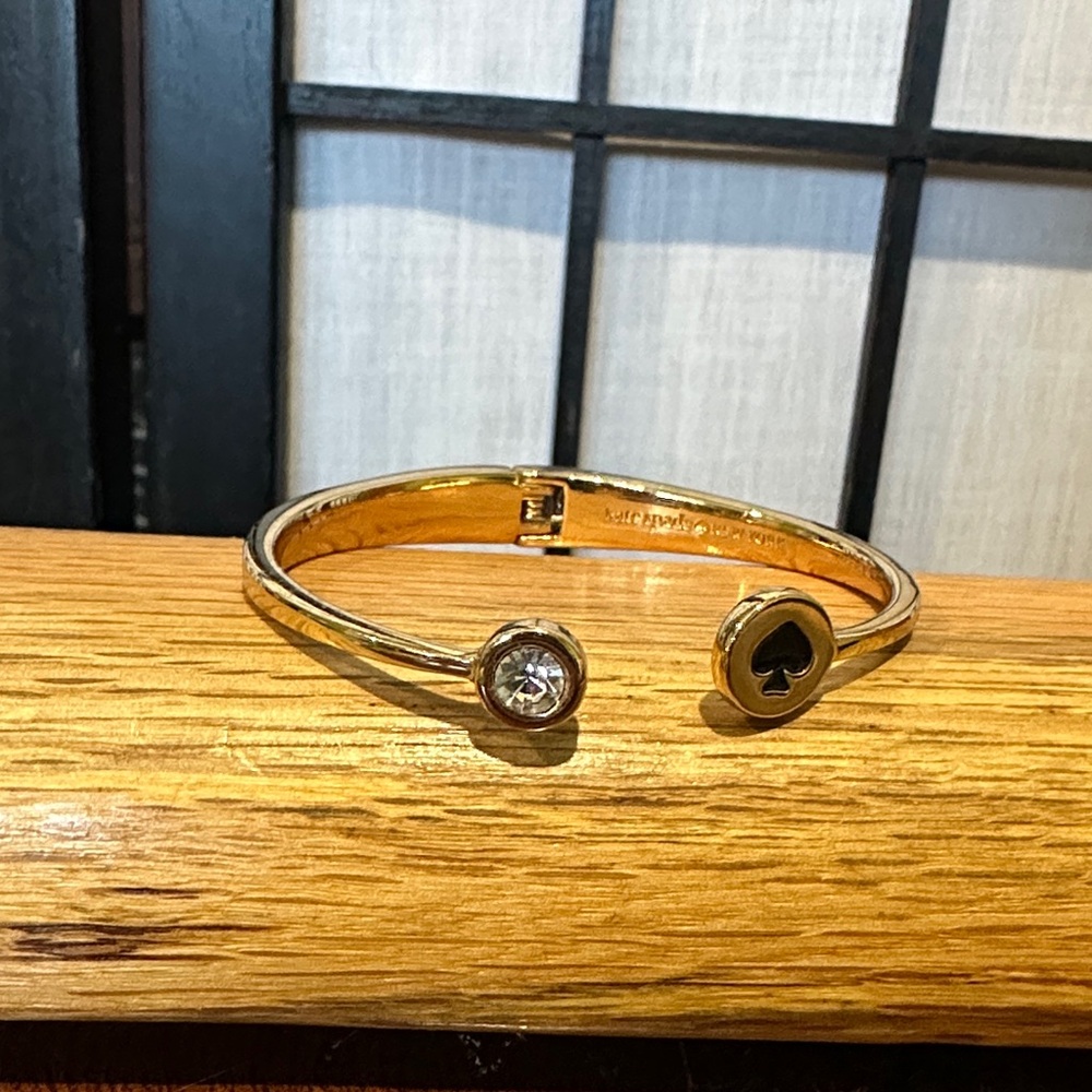 Kate Spade Gold Bracelet with Black Spade Charm Hinge Open Small